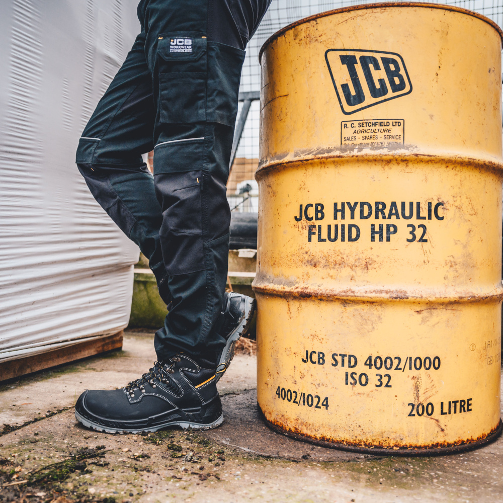 részlet JCB Trade Hybrid Stretch černé pánské pracovní kalhoty